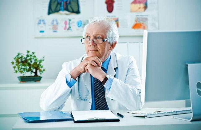Male doctor in his office