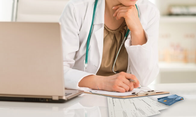 Thoughtful female doctor sitting at a desk in the office